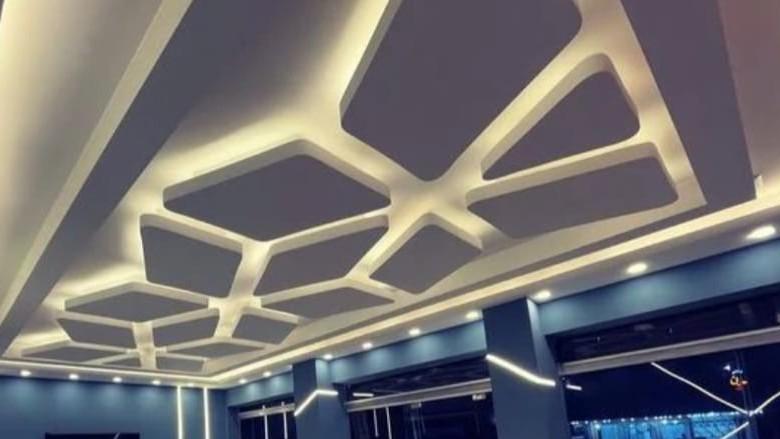 Luxurious bedroom with decorative ceiling